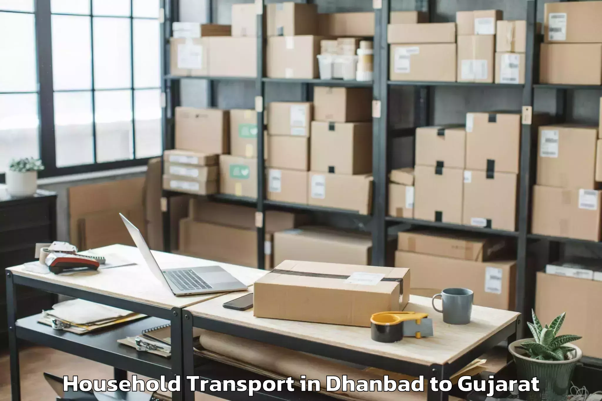 Reliable Dhanbad to Abrama Household Transport